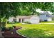 Lovely single-story home with a manicured lawn, tidy landscaping, and attached two car garage at 1957 8Th Street Se Ln, Hickory, NC 28602