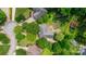 Stunning aerial view of a home nestled within a lush green neighborhood with mature trees and landscaped yards at 2005 Schofield Pl, Salisbury, NC 28144