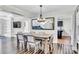 Spacious dining room features dark hardwood floors, stylish furniture, and a modern light fixture at 2005 Schofield Pl, Salisbury, NC 28144