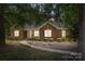 Charming brick home with tidy landscaping, bright windows, and a welcoming walkway to the front door at 2005 Schofield Pl, Salisbury, NC 28144