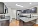 Updated kitchen with granite countertops, stainless steel appliances, and ample cabinet space at 2005 Schofield Pl, Salisbury, NC 28144