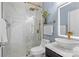 Modern bathroom with a glass-enclosed shower, marble walls, and a vessel sink at 2213 Iron Works Dr, Clover, SC 29710