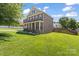 Well-maintained brick home with a spacious lawn and inviting curb appeal at 2213 Iron Works Dr, Clover, SC 29710