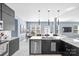 Modern kitchen featuring stainless appliances, sleek cabinets, and a large island at 2213 Iron Works Dr, Clover, SC 29710