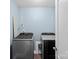 Modern laundry room features Samsung washer and dryer, ensuring efficient and convenient laundry care at 2213 Iron Works Dr, Clover, SC 29710