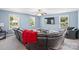 Spacious living room with large sectional sofa, modern TV, and lots of natural light at 2213 Iron Works Dr, Clover, SC 29710