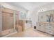 Bathroom features a walk-in shower, soaking tub, and vanity with drawers and cabinets at 240 Bells Crossing Dr, Mooresville, NC 28117