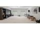 Large bonus room featuring a built-in bookcase and space for a multitude of activities at 240 Bells Crossing Dr, Mooresville, NC 28117