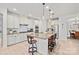 Beautiful kitchen with granite countertops, large island with seating, and stainless-steel appliances at 240 Bells Crossing Dr, Mooresville, NC 28117