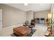 A flexible space currently used as an office with a brown storage chest and room for multiple desks at 240 Bells Crossing Dr, Mooresville, NC 28117