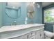 Bathroom featuring double vanity with decorative mirrors and modern fixtures at 2618 Pineview Dr, Lancaster, SC 29720