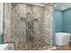 Modern bathroom featuring a glass shower, pebble accents, and a built in bench at 2618 Pineview Dr, Lancaster, SC 29720