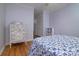 Charming bedroom with wood floors and vintage dresser at 2618 Pineview Dr, Lancaster, SC 29720