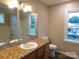 Bathroom featuring a sink, toilet, shower/tub combo, and a large mirror at 3001 Austin Chaney Rd, Monroe, NC 28110