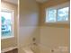 Bathroom bathtub view showing window with natural light at 3001 Austin Chaney Rd, Monroe, NC 28110