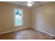 Bedroom with a window providing natural light and neutral-toned walls at 3001 Austin Chaney Rd, Monroe, NC 28110