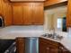 Well-equipped kitchen featuring stainless steel appliances, ample counter space, and stylish wooden cabinetry at 3001 Austin Chaney Rd, Monroe, NC 28110