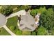 Aerial view of property with lush landscaping and a pristine lawn at 3009 Botetourt Ct, Weddington, NC 28104