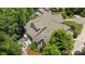 Aerial view of home with deck, patio, and beautiful landscaping at 3009 Botetourt Ct, Weddington, NC 28104