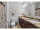 Bathroom with granite countertops, modern vanity, and tiled floors at 3009 Botetourt Ct, Weddington, NC 28104