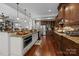 Well-equipped kitchen featuring granite countertops, stainless steel appliances, and seamless flow to the living spaces at 3009 Botetourt Ct, Weddington, NC 28104