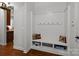 Functional mud room with built-in bench, storage cubbies, and convenient access from the exterior at 3009 Botetourt Ct, Weddington, NC 28104