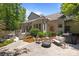 Outdoor patio with a hot tub, chairs, and a fire pit, perfect for entertaining guests at 3009 Botetourt Ct, Weddington, NC 28104
