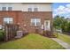 Charming backyard with lawn, fenced perimeter, and a small staircase at 3013 Coventry Commons Dr, Mint Hill, NC 28227