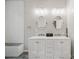 Modern bathroom with a double vanity, marble countertop, and subway tile backsplash at 3013 Coventry Commons Dr, Mint Hill, NC 28227