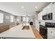 Open-concept kitchen and living area with hardwood floors and modern finishes at 3013 Coventry Commons Dr, Mint Hill, NC 28227
