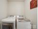 A laundry room featuring a modern washer and dryer set at 3013 Coventry Commons Dr, Mint Hill, NC 28227