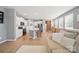 Bright and airy living room offering seamless flow to a modern kitchen area at 3013 Coventry Commons Dr, Mint Hill, NC 28227