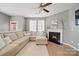 Relaxing living room with a fireplace and cozy sectional sofa at 3013 Coventry Commons Dr, Mint Hill, NC 28227