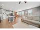 Cozy living room featuring stylish furnishings and a view of the modern kitchen at 3013 Coventry Commons Dr, Mint Hill, NC 28227