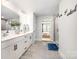 Elegant bathroom with double vanity, stylish mirrors, a walk-in shower, and modern fixtures at 355 Ladybird Ln, Pineville, NC 28134