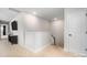 Upstairs hallway with TV and table with a staircase and closet to the right at 355 Ladybird Ln, Pineville, NC 28134