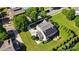 Aerial view of the property highlighting the solar panels, landscaping, and outdoor living spaces at 3808 Halcyon Dr, Huntersville, NC 28078