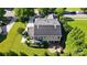 Overhead view of a home with solar panels, surrounded by a lush green lawn at 3808 Halcyon Dr, Huntersville, NC 28078