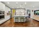 Large kitchen island with bar seating and modern appliances provides ample room for entertaining at 3808 Halcyon Dr, Huntersville, NC 28078