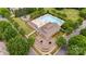 Aerial view of the community pool, featuring lounge chairs and a clubhouse at 3808 Halcyon Dr, Huntersville, NC 28078