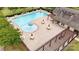 Aerial shot of the community pool area, showcasing ample seating and a well-maintained facility at 3808 Halcyon Dr, Huntersville, NC 28078