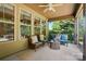 Relaxing screened porch with comfortable seating, perfect for enjoying the outdoors at 3808 Halcyon Dr, Huntersville, NC 28078