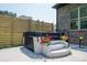 Backyard hot tub with easy step access and potted plants for decoration at 4143 Willow Haven Dr, Denver, NC 28037