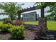 Charming neighborhood entrance sign with stone pillars and lush greenery at 4143 Willow Haven Dr, Denver, NC 28037