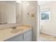 Bathroom featuring a simple vanity, neutral color palette, and shower access at 4499 Briarcreek Rd, Maiden, NC 28650