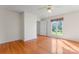 Well-lit bedroom with hardwood floors and a view of the outside landscape at 4499 Briarcreek Rd, Maiden, NC 28650