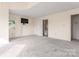 Bedroom with carpet, large windows, and access to a bright, neutral bathroom at 4499 Briarcreek Rd, Maiden, NC 28650