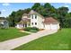 Charming two-story home with an attached two-car garage and spacious front yard at 4499 Briarcreek Rd, Maiden, NC 28650