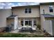 An outdoor patio provides a great view of the backyard at 4728 Cottage Oaks Dr, Charlotte, NC 28269