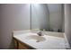 Convenient half bath with a neutral vanity, sink, and a large mirror at 4728 Cottage Oaks Dr, Charlotte, NC 28269